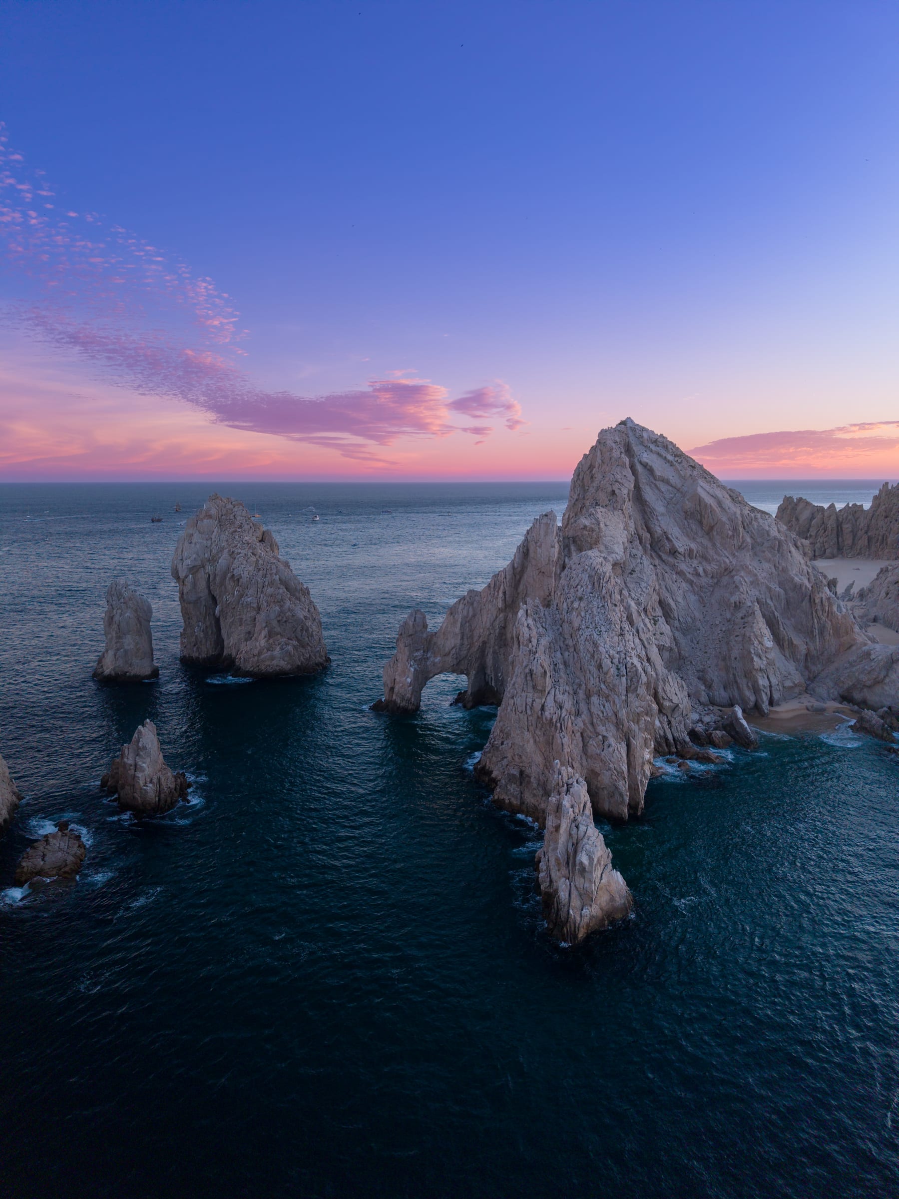 Aerial drone view of luxury architecture on the Los Cabos coastline